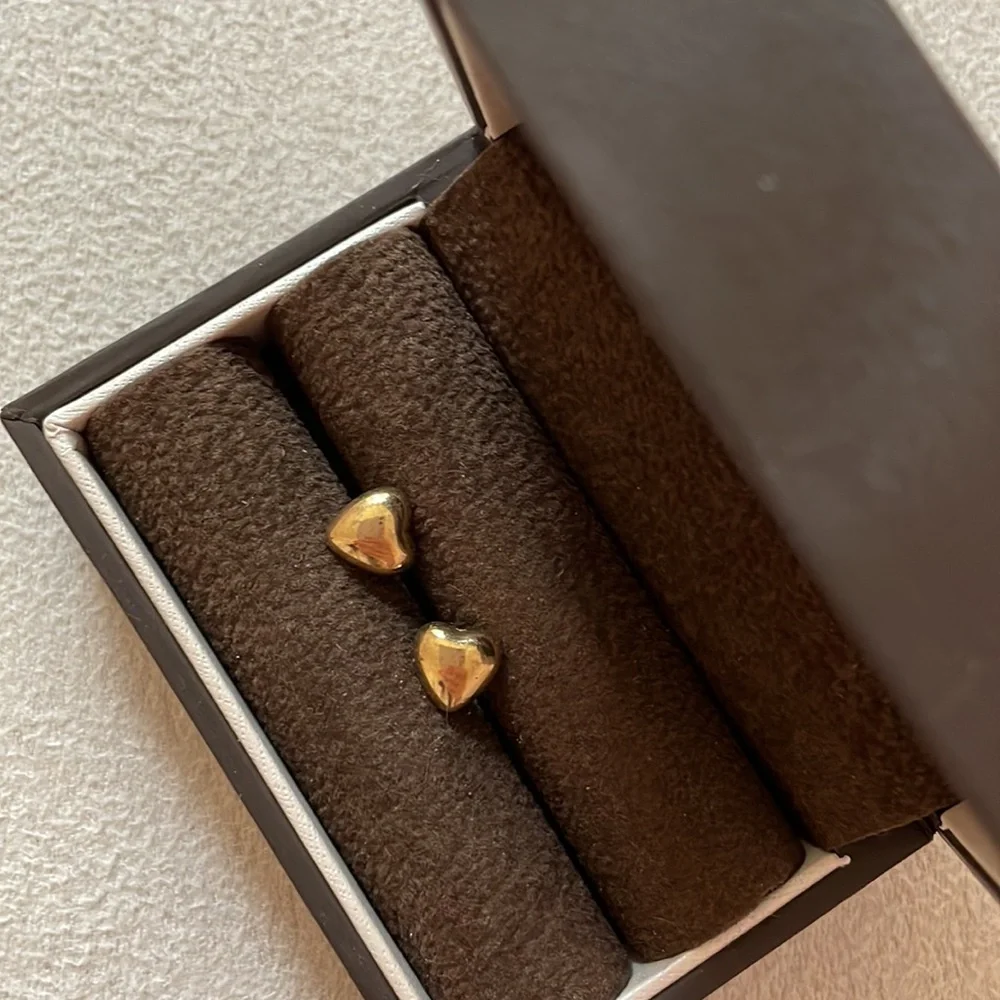 Heart shaped gold studs